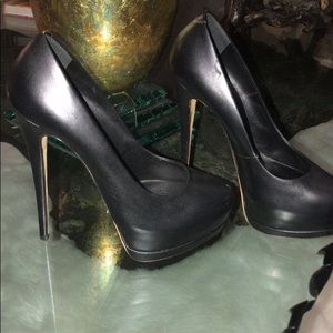 Stiletto black leather shoes